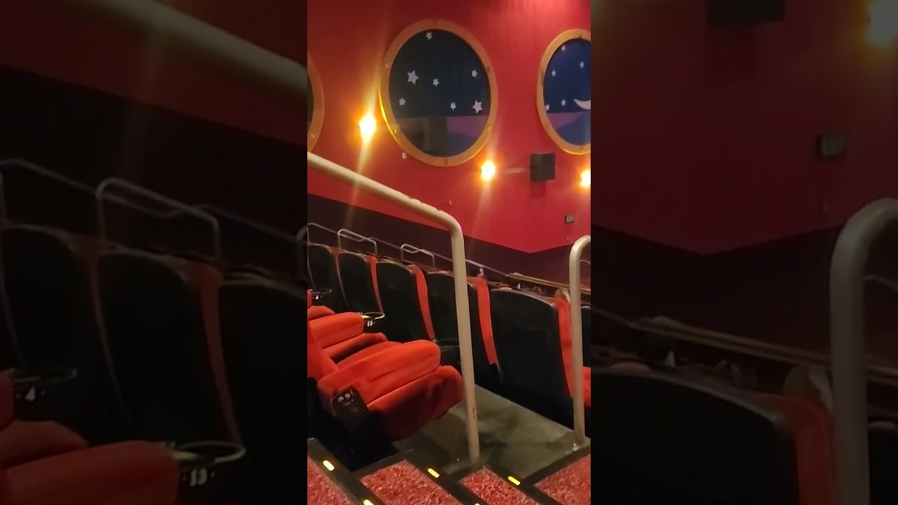 Edwards Regal Stadium Cinema theater has circle shaped windows like a Submarine Irvine CA 4/15/2023