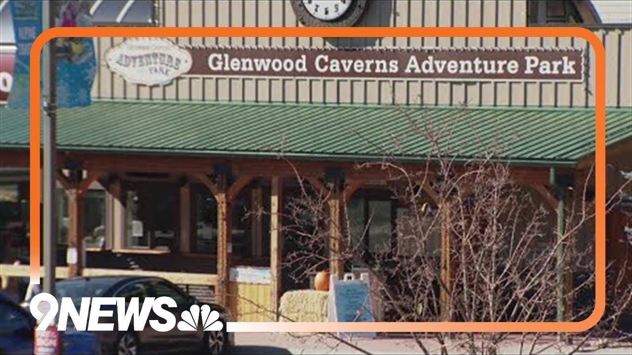 Man who entered amusement park with guns, explosives found dead near words on a wall