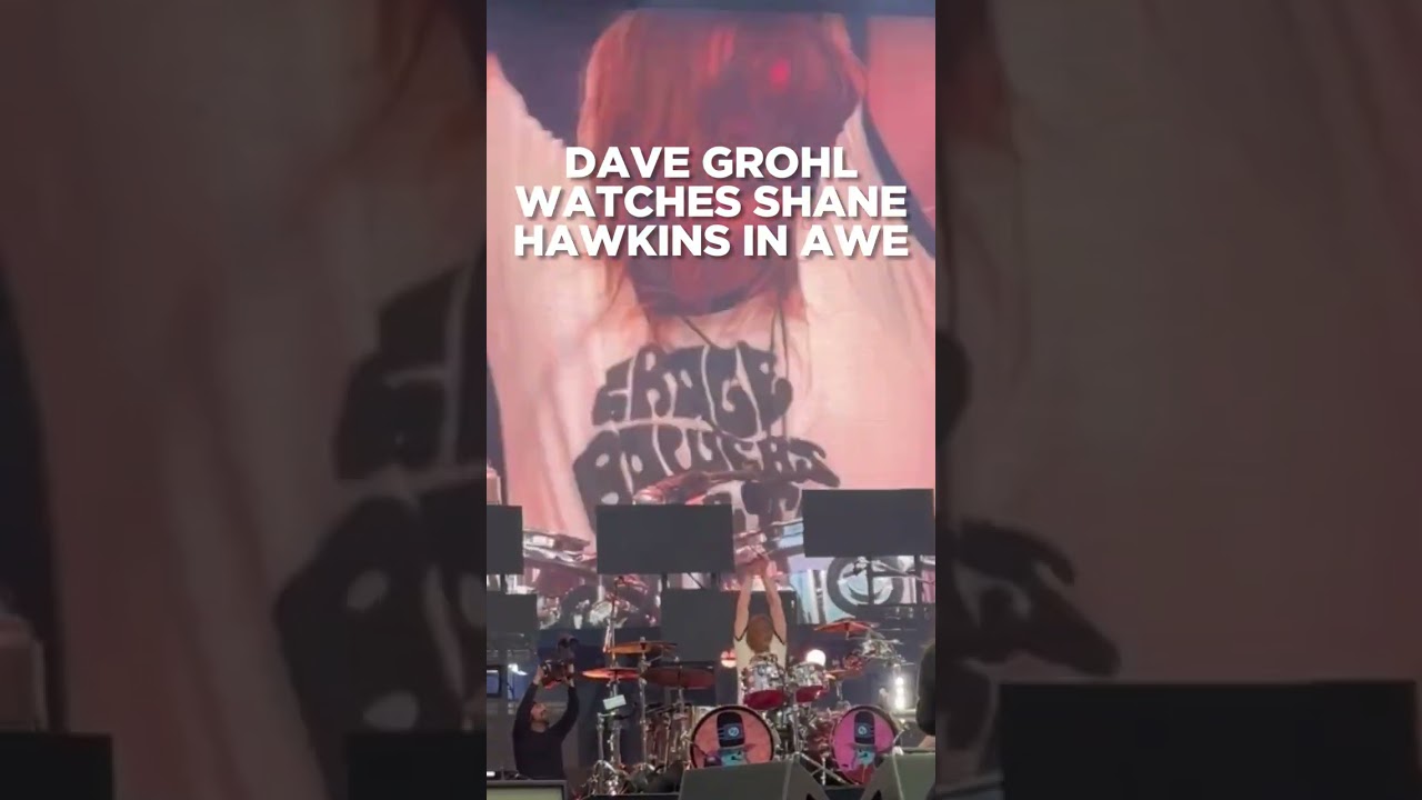 Dave Grohl watches Shane Hawkins play drums in awe
