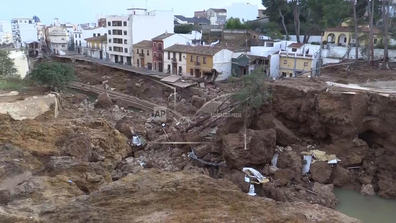 Residents of Valencian town of Chiva assess damage, collect bottled water